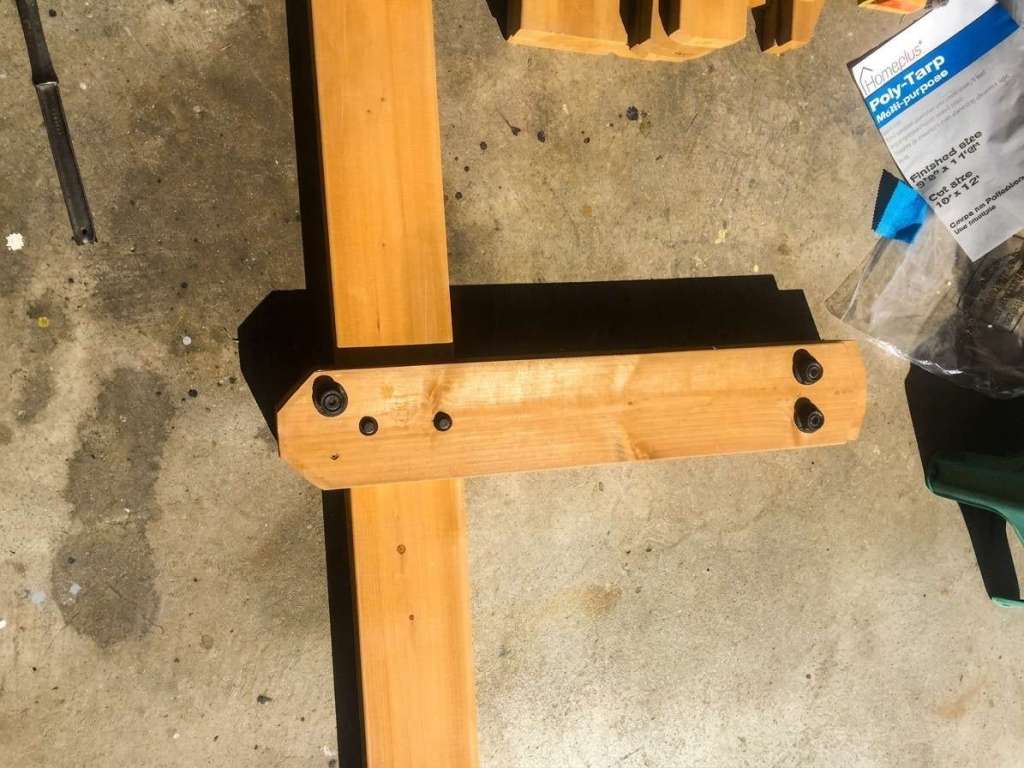 Adding decorative caps over the bolts on the gazebo beam