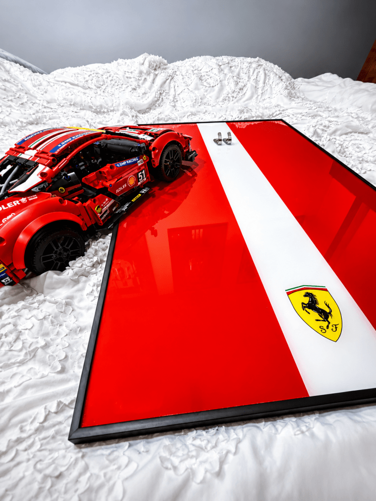 Picture-hanging hardware for LEGO Technic display frame wall installation